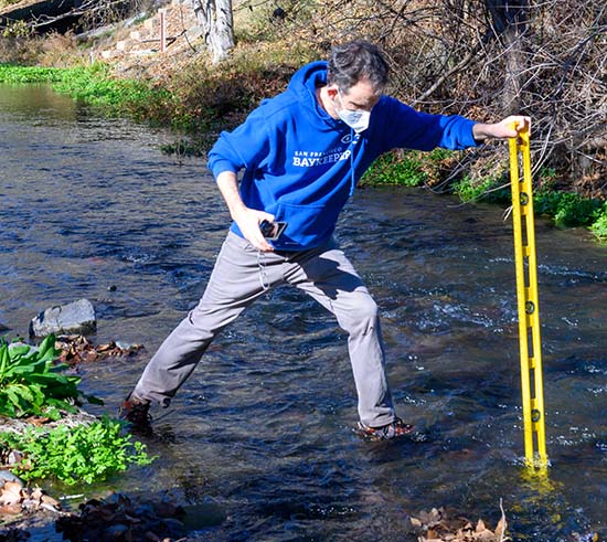 Jon sampling water