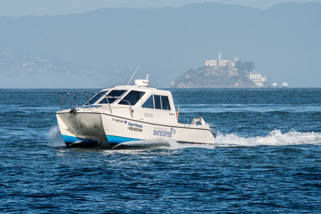 Baykeeper boat on the Bay with Alcatraz in the background