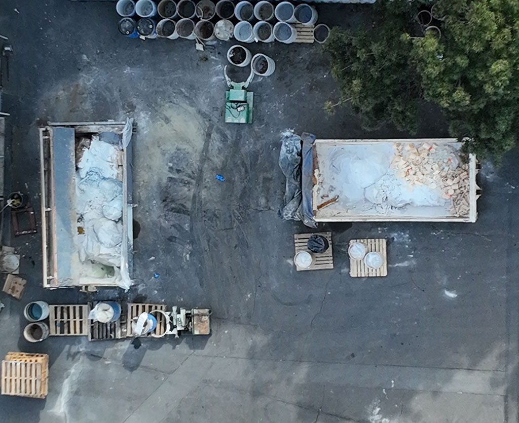 Drone image of open containers spilling over at the Morgan facility in Hayward