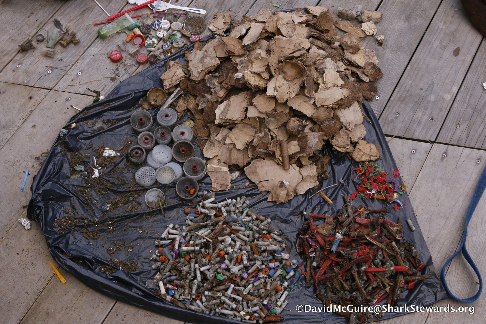 A pile of plastic and wood fireworks debris